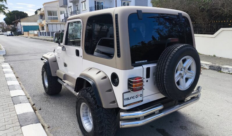 
								2001 Model Jeep Wrangler Sahara Edition 4×4 Benzın Otomatik dolu									