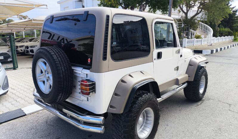 
								2001 Model Jeep Wrangler Sahara Edition 4×4 Benzın Otomatik dolu									